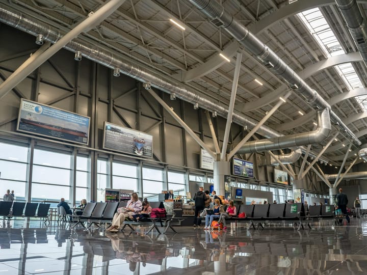Departure hall at a modern airport terminal — Frankfurt Airport Terminal 3